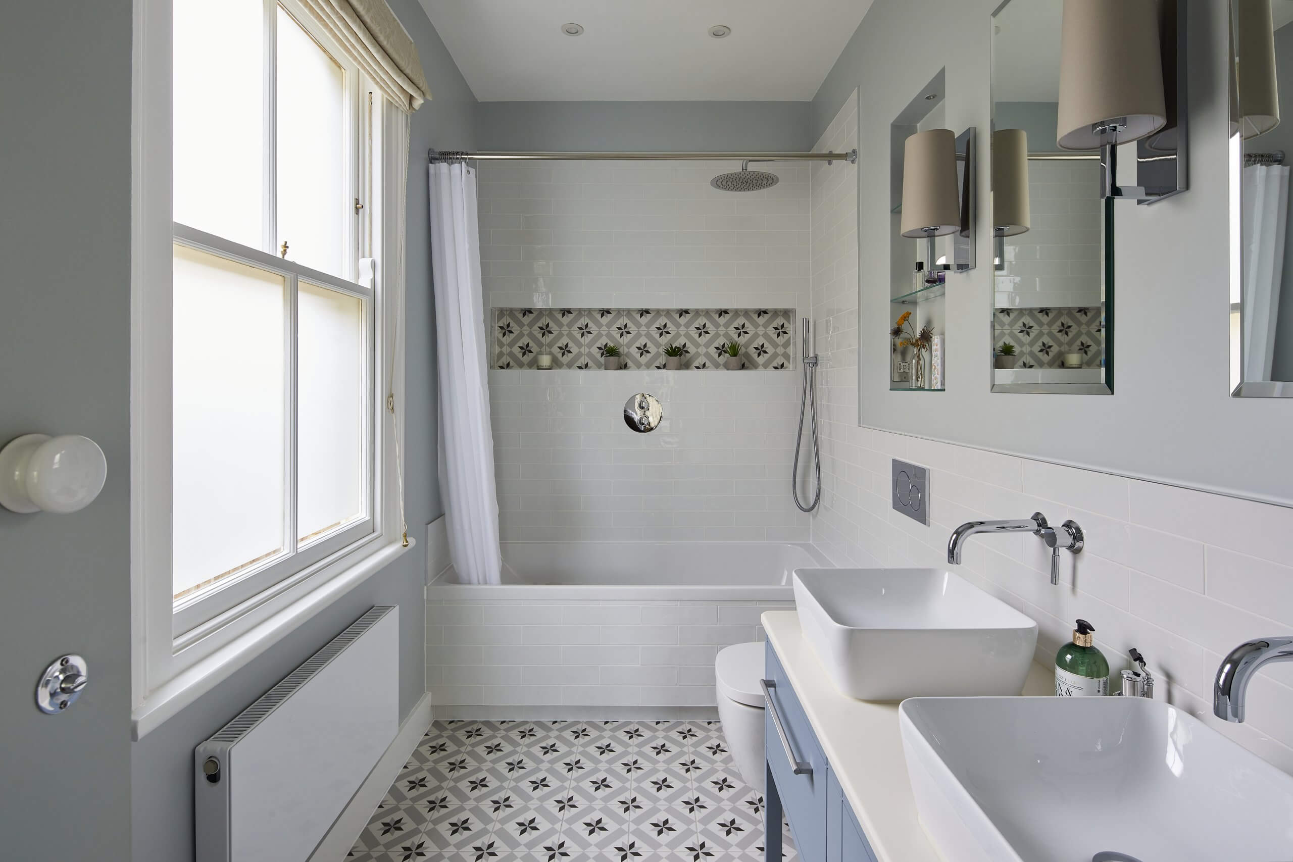 White and light with patterned tiles in Teddington | Contemporary Ensuite